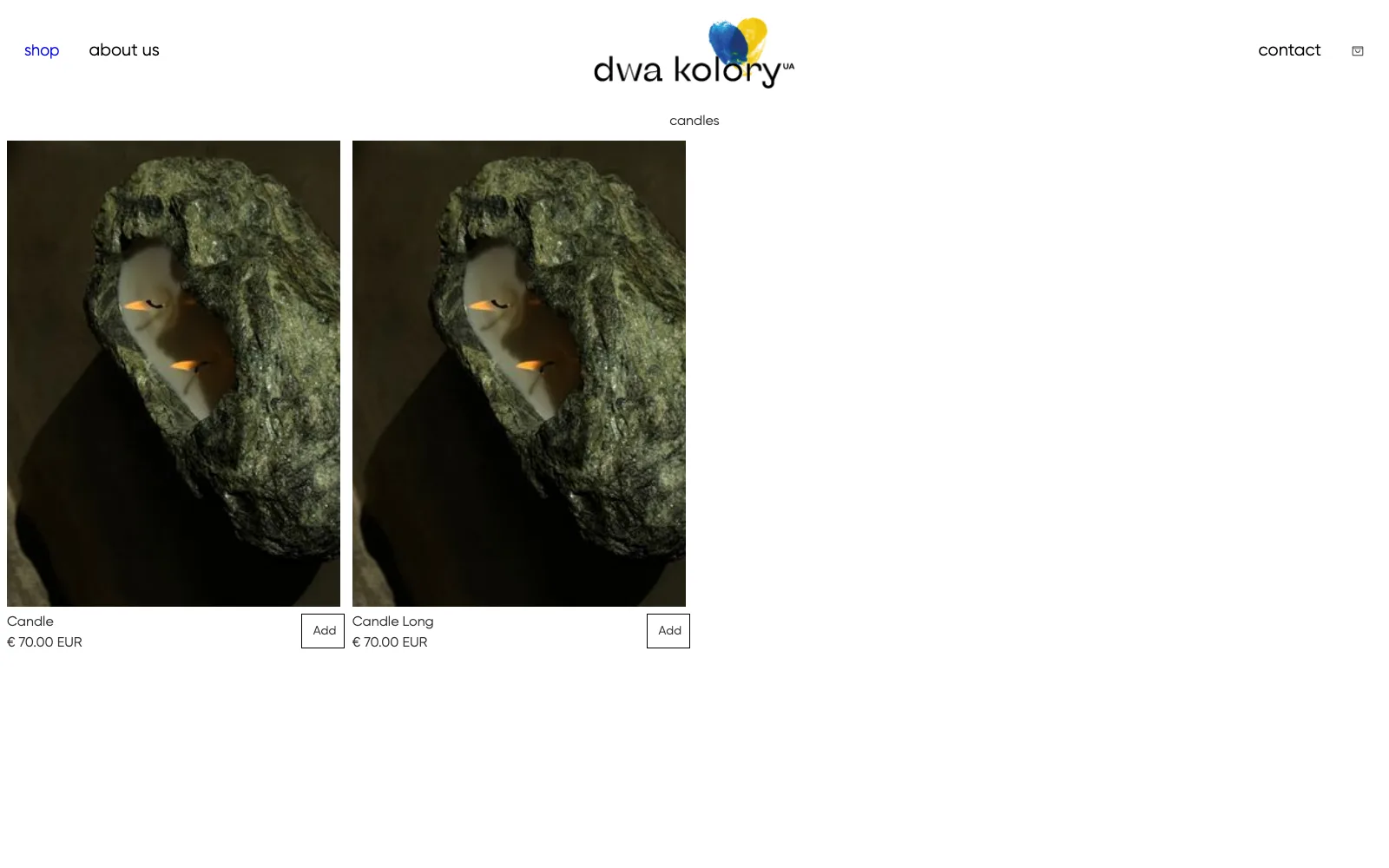 Dwa Kolory desktop candles category page, showing two stone-carved candles priced at €70 each.
