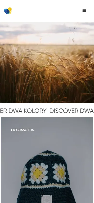 Dwa Kolory mobile homepage with a wheat field hero photo above the start of a stacked category row.