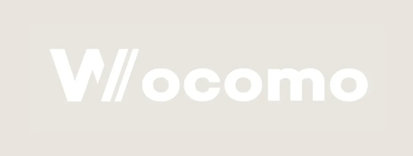 wocomo's primary mark: a navy tile with the W// icon, next to the 'wocomo' wordmark in white.